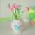 Vase med blomster af foam clay